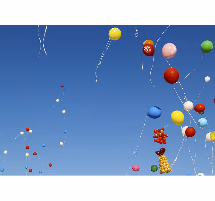 Blind children enjoy colorful balloons in the sky - TenStickers