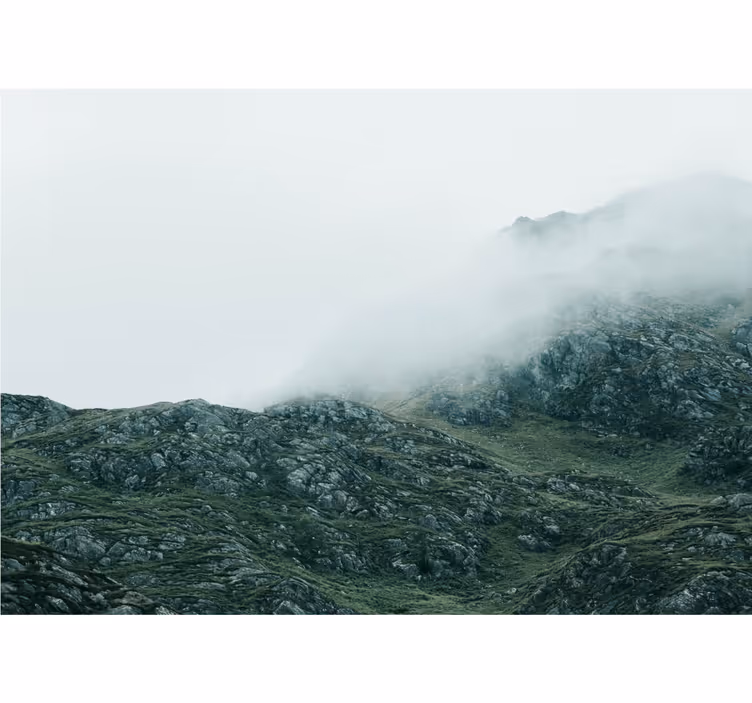 Views in dense fog wall mural mountain - TenStickers
