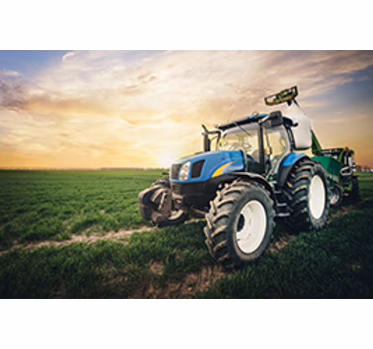 Tractor on a sunset wall mural - TenStickers