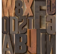 Brown 3D effect lettering wallpaper