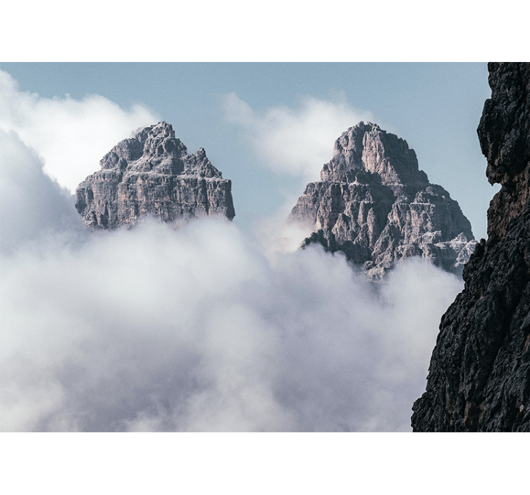 Wall mural mountain majestic peaks above clouds - TenStickers