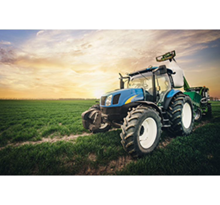 Tractor on a sunset wall mural - TenStickers