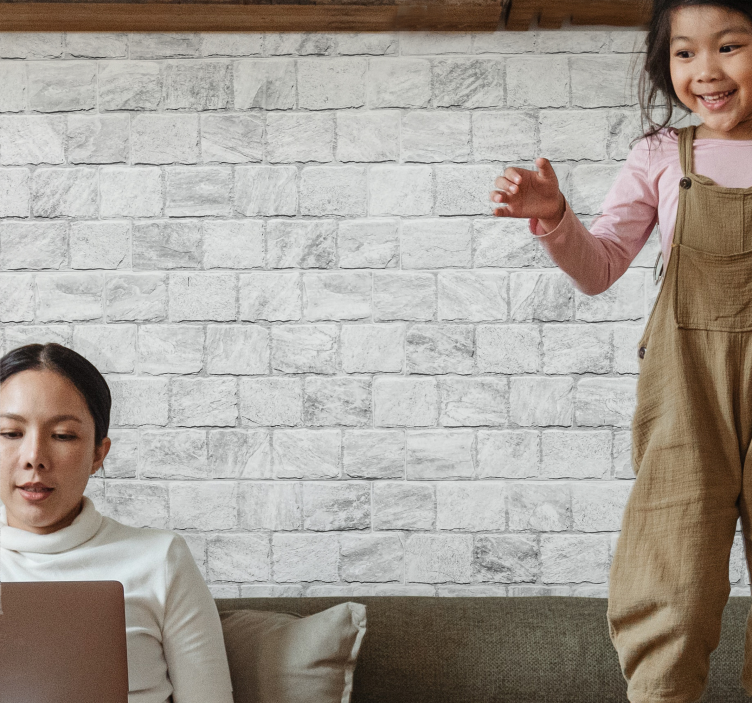 Brick mural wallpaper happy child at play - TenStickers