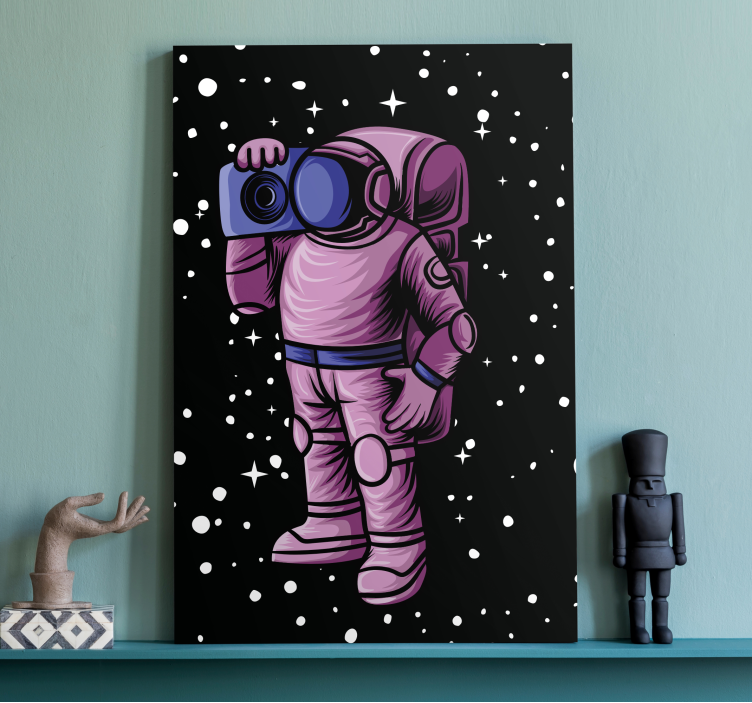 Astronaut capturing stars video game canvas art - TenStickers