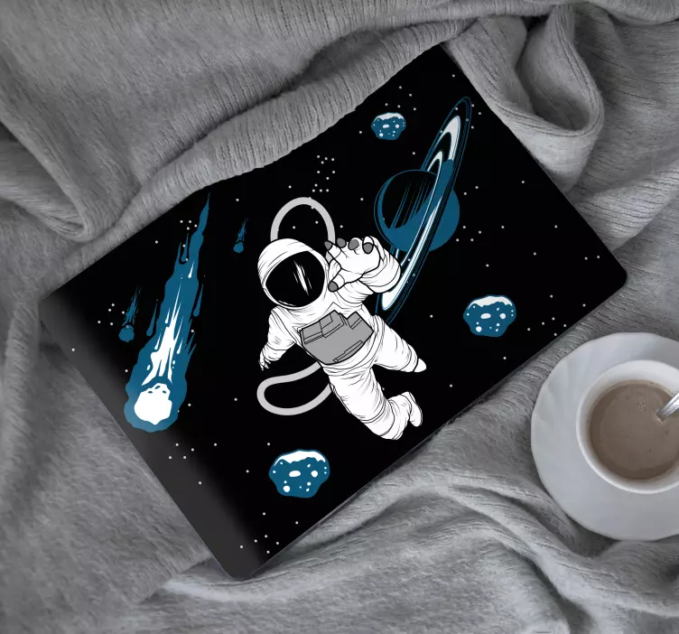 Laptop sticker astronaut floating in cosmos - TenStickers