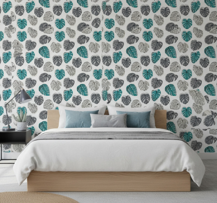 Monstera leaf pattern wall paper in bedroom - TenStickers